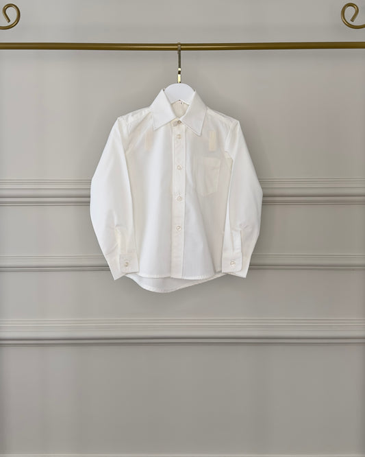 Camisa social infantil branca da Etiquette com bolso frontal. Modelo clássico, confortável e elegante para pajens.