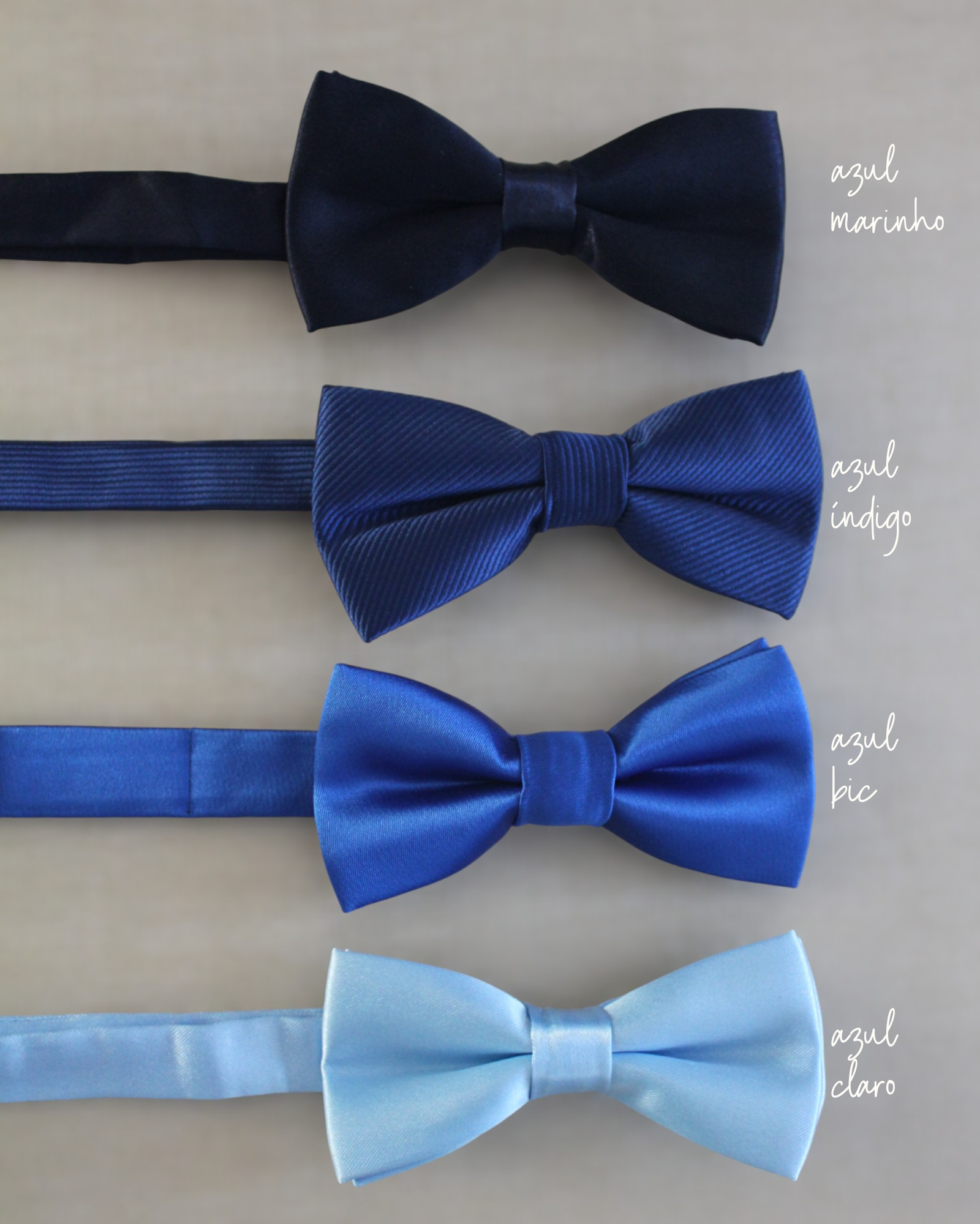 Gravatinha borboleta infantil em cetim nos tons de azul, com regulagem no pescoço. Acessório elegante para pajens.